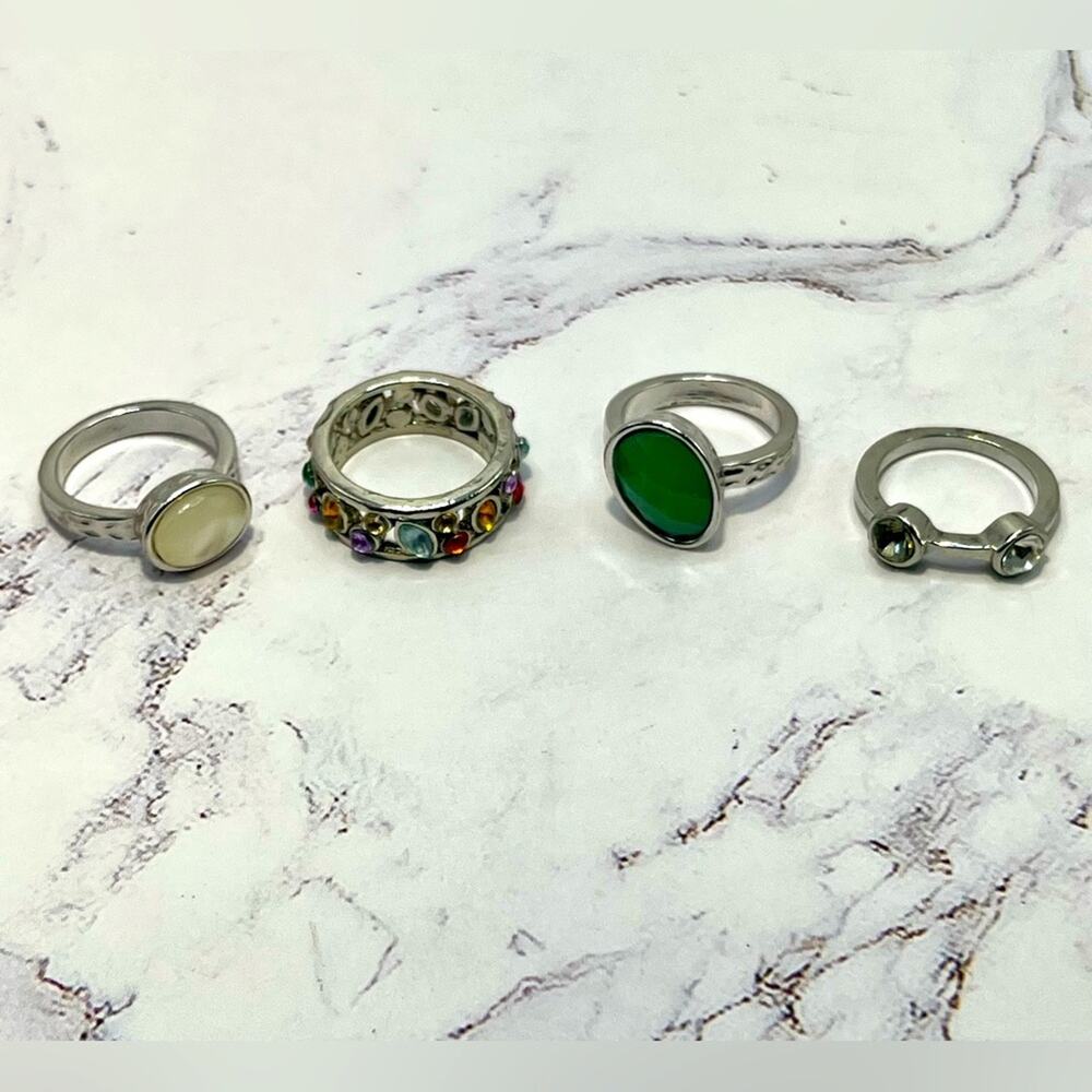 4 Silver tone rings with colored rhinestones and beads